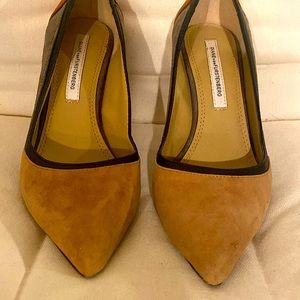 Diane von Furstenberg suede pumps.